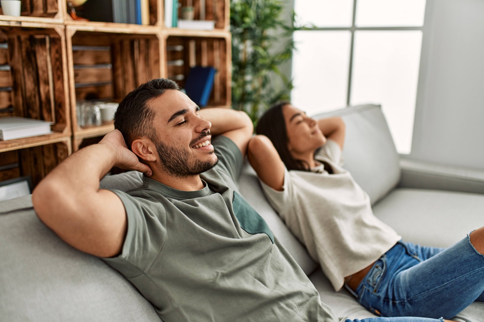 young couple relaxing with good indoor air quality in Houston, TX